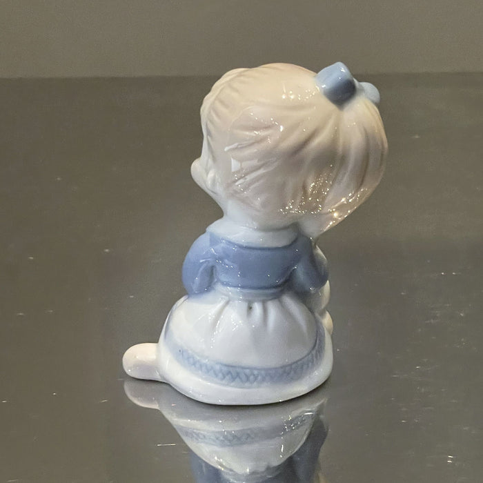 Escultura Criança